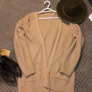 Beige women’s knitted sweater